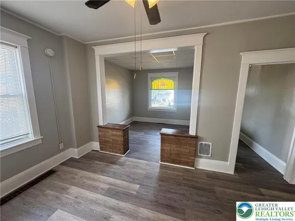 wooden floor and window in a room