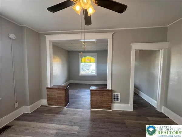 a view of livingroom with furniture and wooden floor