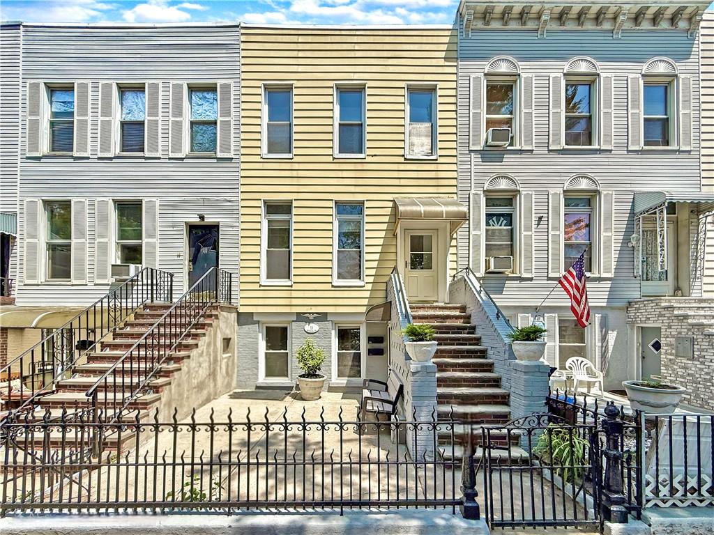 13 Windsor Place Brooklyn, NY 11215 - Photo 1 of 40 a front view of a house with a porch