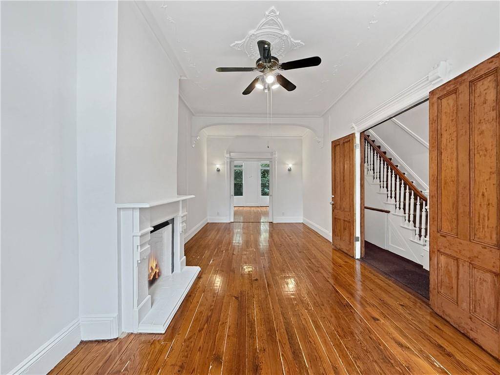 13 Windsor Place Brooklyn, NY 11215 - Photo 13 of 40 a view of a hallway with wooden floor and staircase