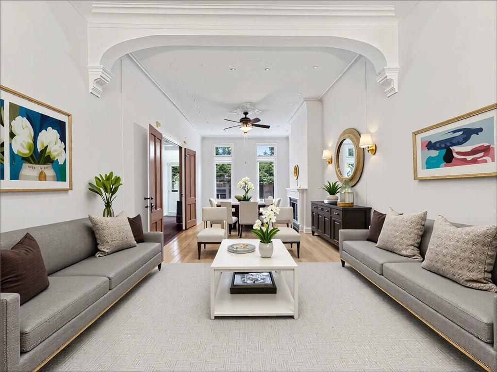 13 Windsor Place Brooklyn, NY 11215 - Photo 16 of 40 a living room with furniture and a large mirror