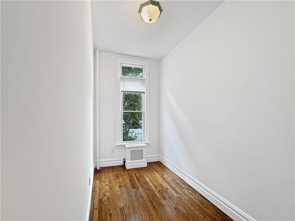13 Windsor Place Brooklyn, NY 11215 - Photo 19 of 40 a view of a room with wooden floor and window