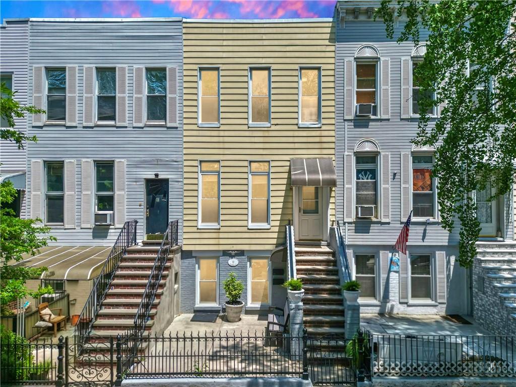 13 Windsor Place Brooklyn, NY 11215 - Photo 2 of 40 a front view of a house with a porch