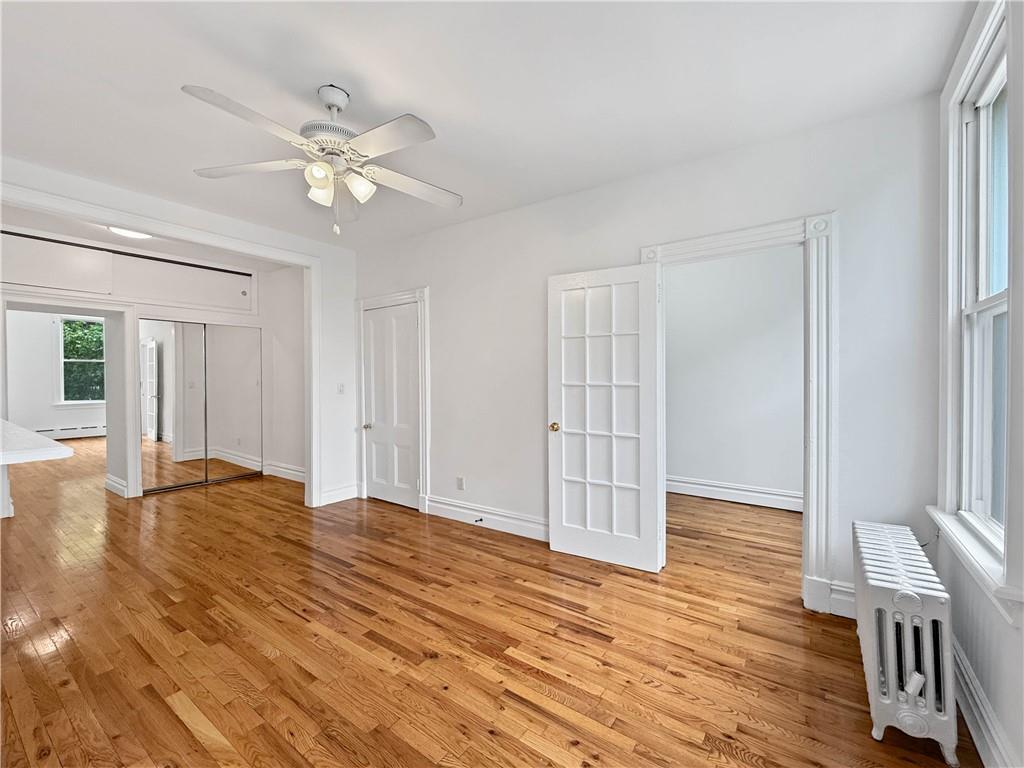 13 Windsor Place Brooklyn, NY 11215 - Photo 21 of 40 a view of an empty room with wooden floor