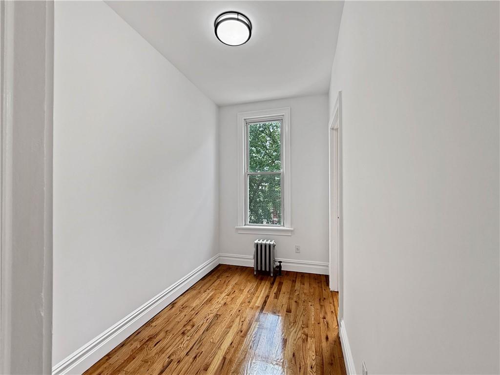 13 Windsor Place Brooklyn, NY 11215 - Photo 22 of 40 a view of a room with wooden floor and window