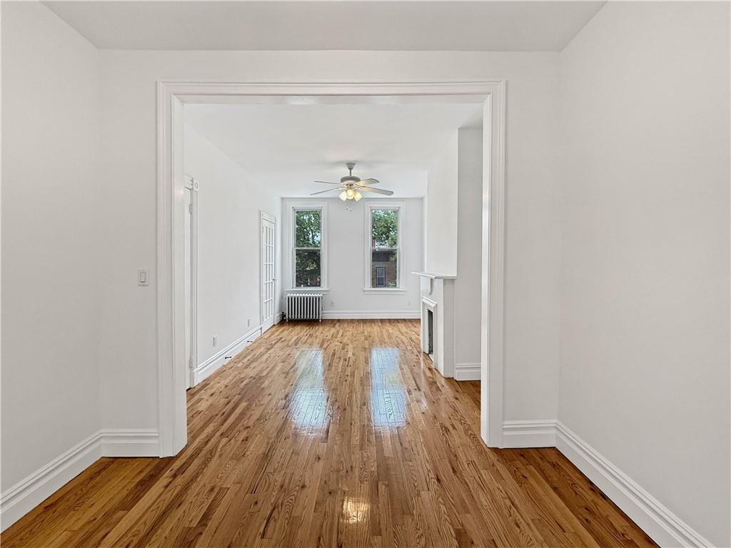 13 Windsor Place Brooklyn, NY 11215 - Photo 23 of 40 wooden floor in an empty room