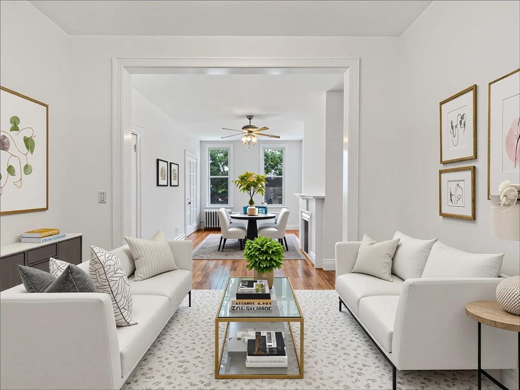 13 Windsor Place Brooklyn, NY 11215 - Photo 24 of 40 a living room with furniture and a wooden floor