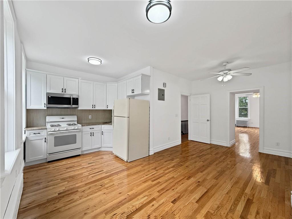 13 Windsor Place Brooklyn, NY 11215 - Photo 26 of 40 a kitchen with stainless steel appliances a refrigerator sink and stove top oven