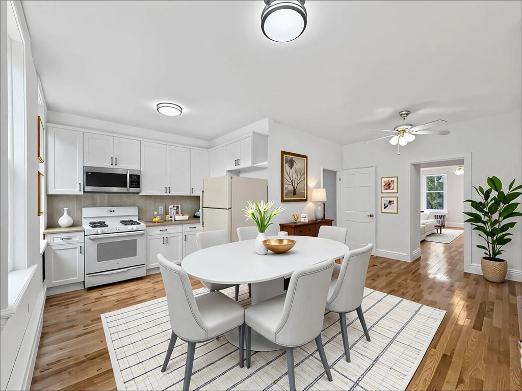 13 Windsor Place Brooklyn, NY 11215 - Photo 27 of 40 a view of a dining room with furniture and wooden floor
