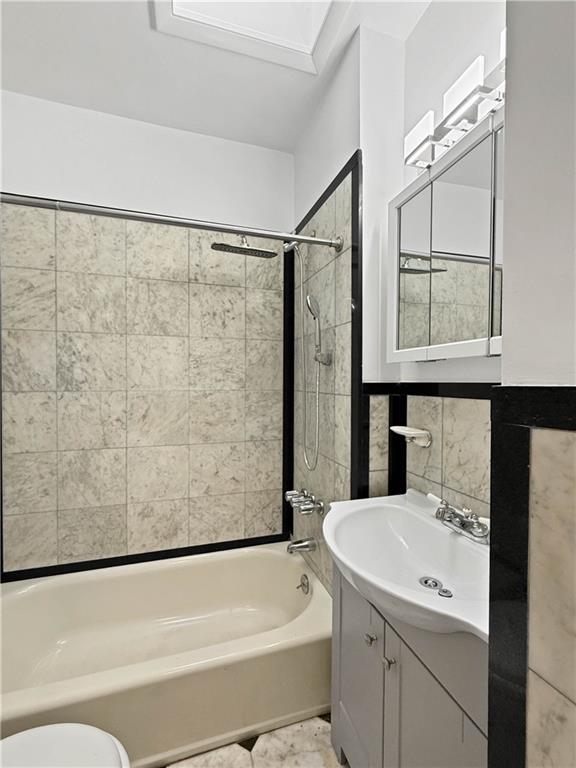 13 Windsor Place Brooklyn, NY 11215 - Photo 29 of 40 a bathroom with a sink a toilet and bathtub