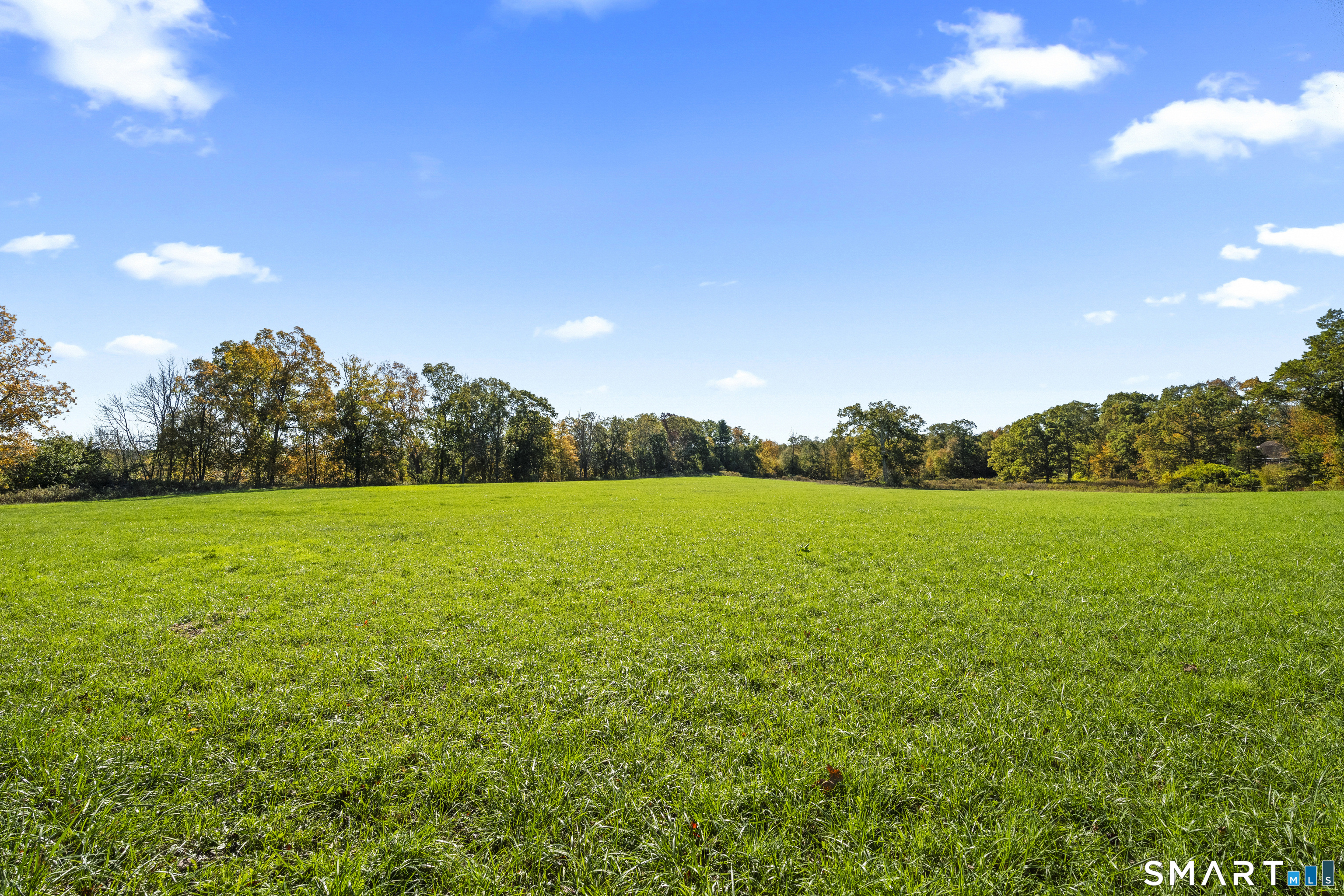 100 Hubbard Hill Road Killingly, CT 06239 - Photo 2 of 2 a view of a green field with clear sky