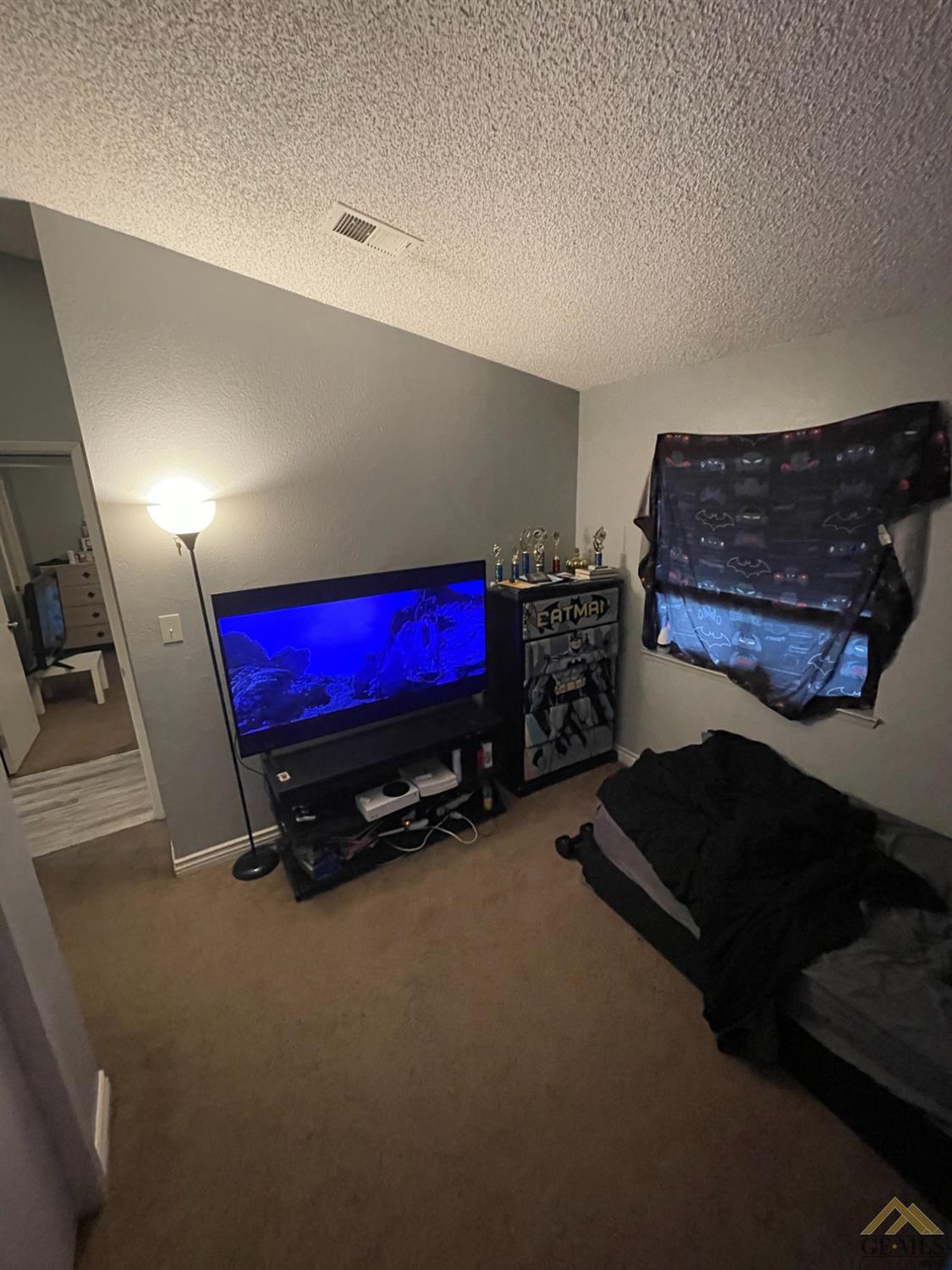 Undisclosed Address Bakersfield, CA 93309 - Photo 8 of 11 a room with gym equipment