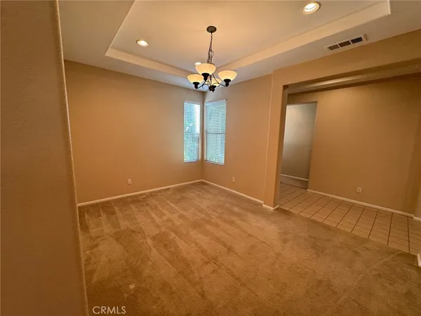 view of an empty room with a window