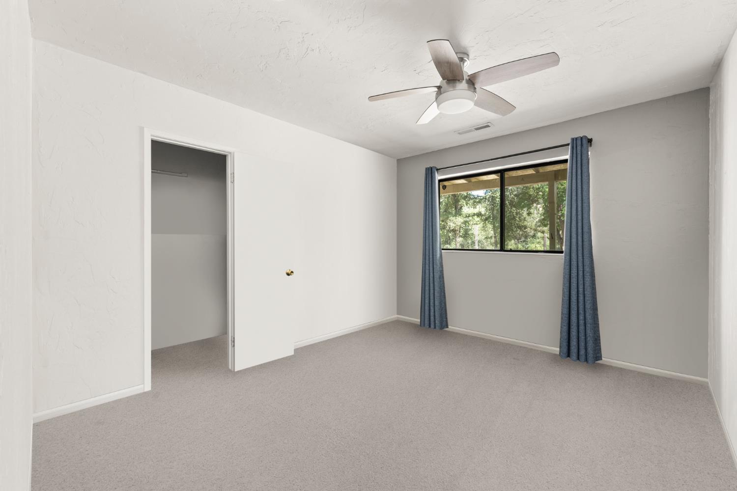 2162 Painted Pony Road Somerset, CA 95684 - Photo 47 of 65 a view of an empty room with a window