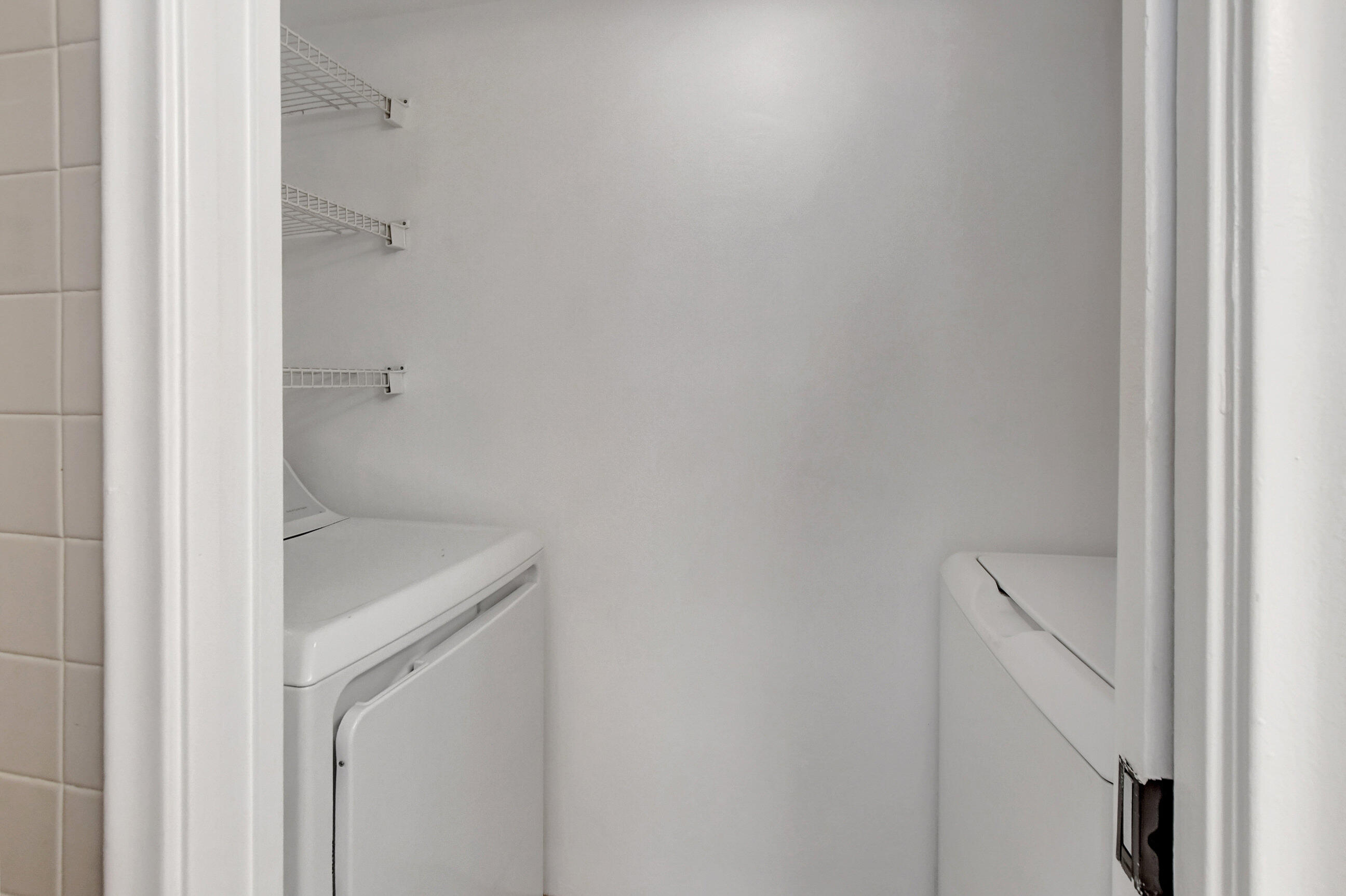 2555 Albatross Road North, Unit 2A Delray Beach, FL 33444 - Photo 16 of 27 a bathroom with a sink