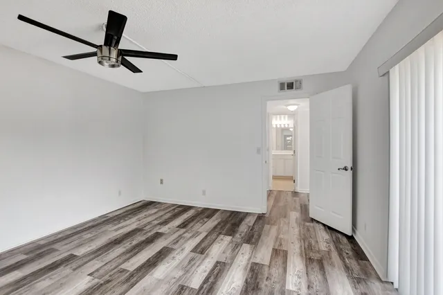 a view of a room with a sink and a window