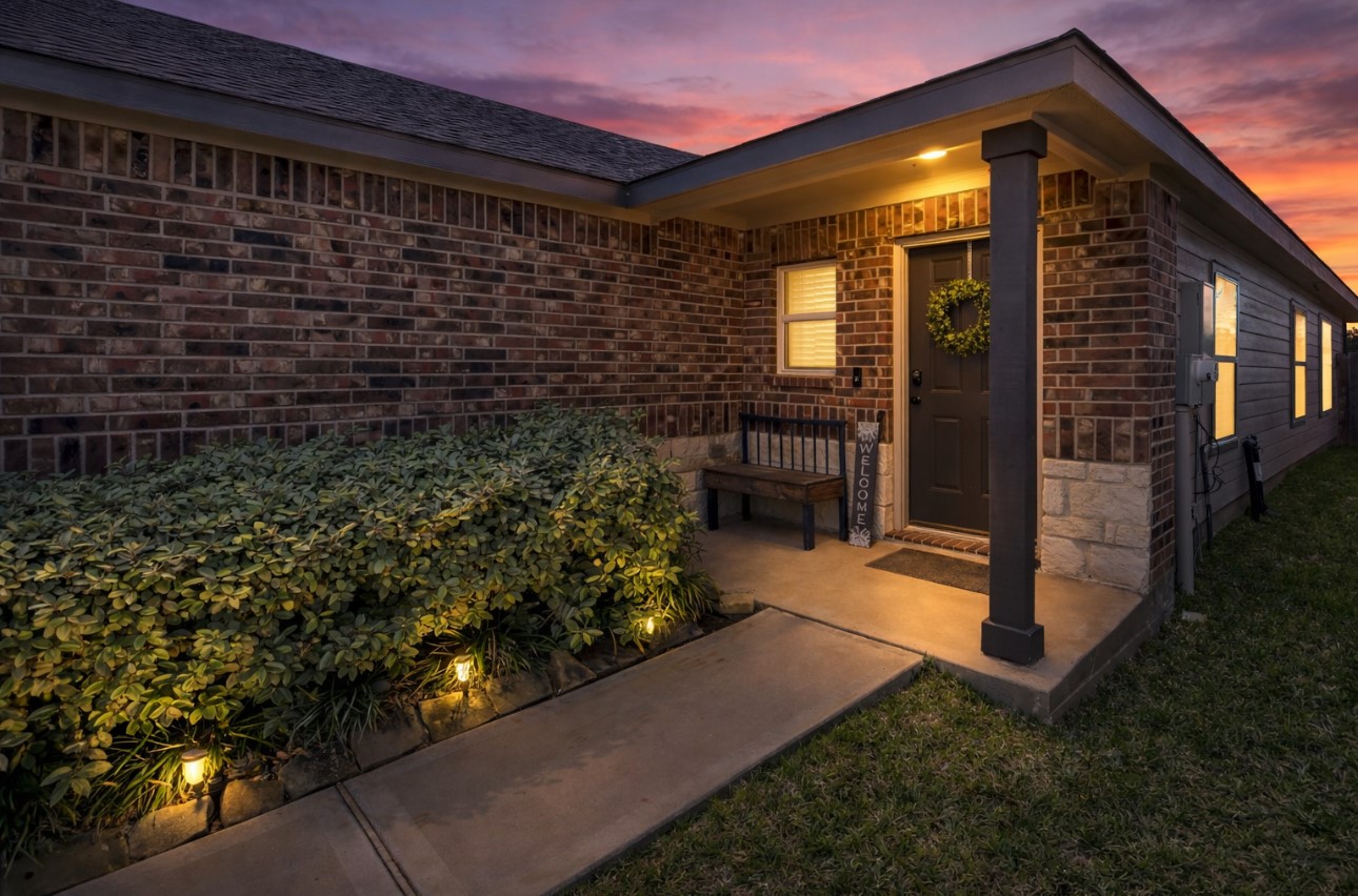514 Dalloway Street Conroe, TX 77316 - Photo 3 of 27 Digitally enhanced twilight image – exterior lighting added
