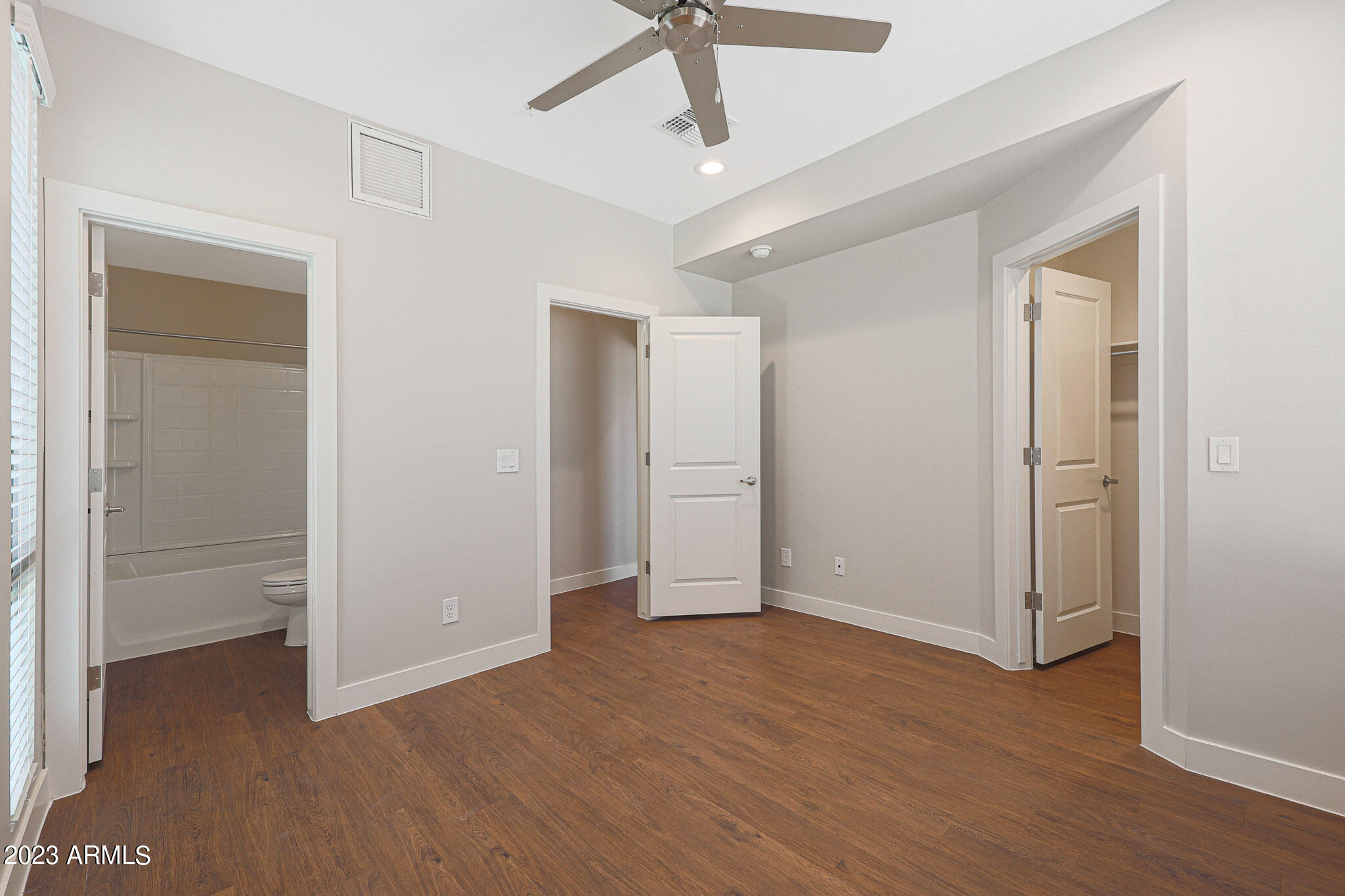 6060 East Baseline Road, Unit 170 Mesa, AZ 85206 - Photo 12 of 45 a view of empty room with wooden floor