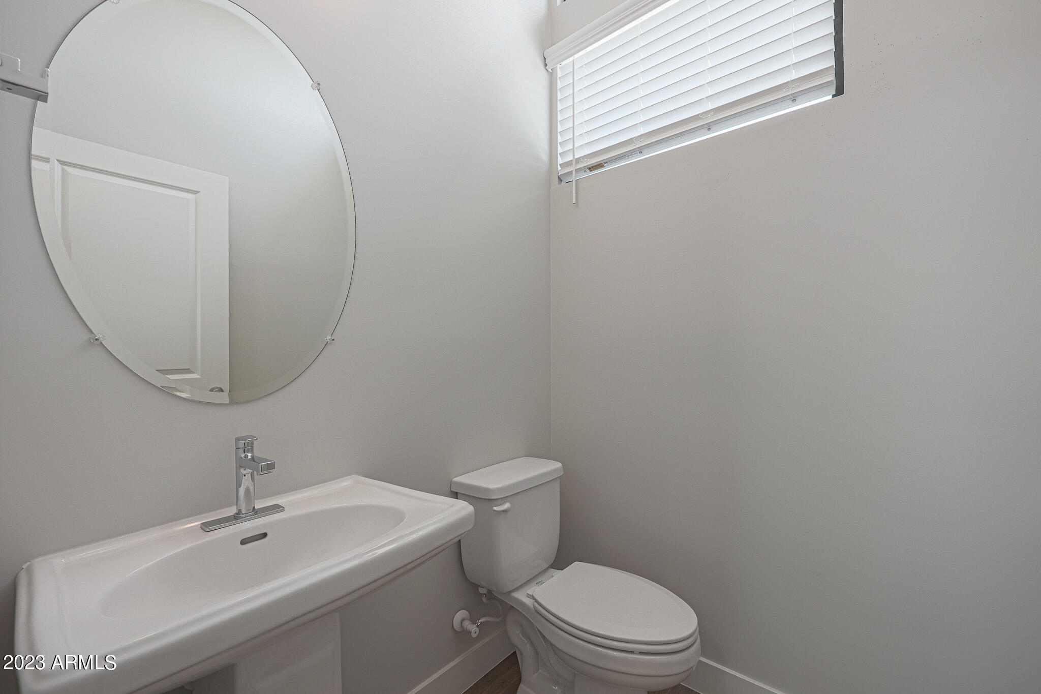 6060 East Baseline Road, Unit 170 Mesa, AZ 85206 - Photo 23 of 45 a white toilet sitting next to a bathroom sink