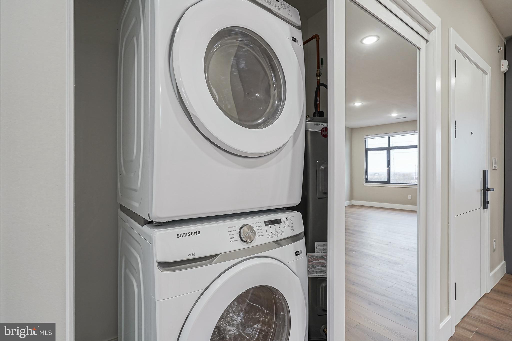 4432-00 Wingate Street, Unit 305 Philadelphia, PA 19136 - Photo 14 of 19 a utility room with dryer and washer