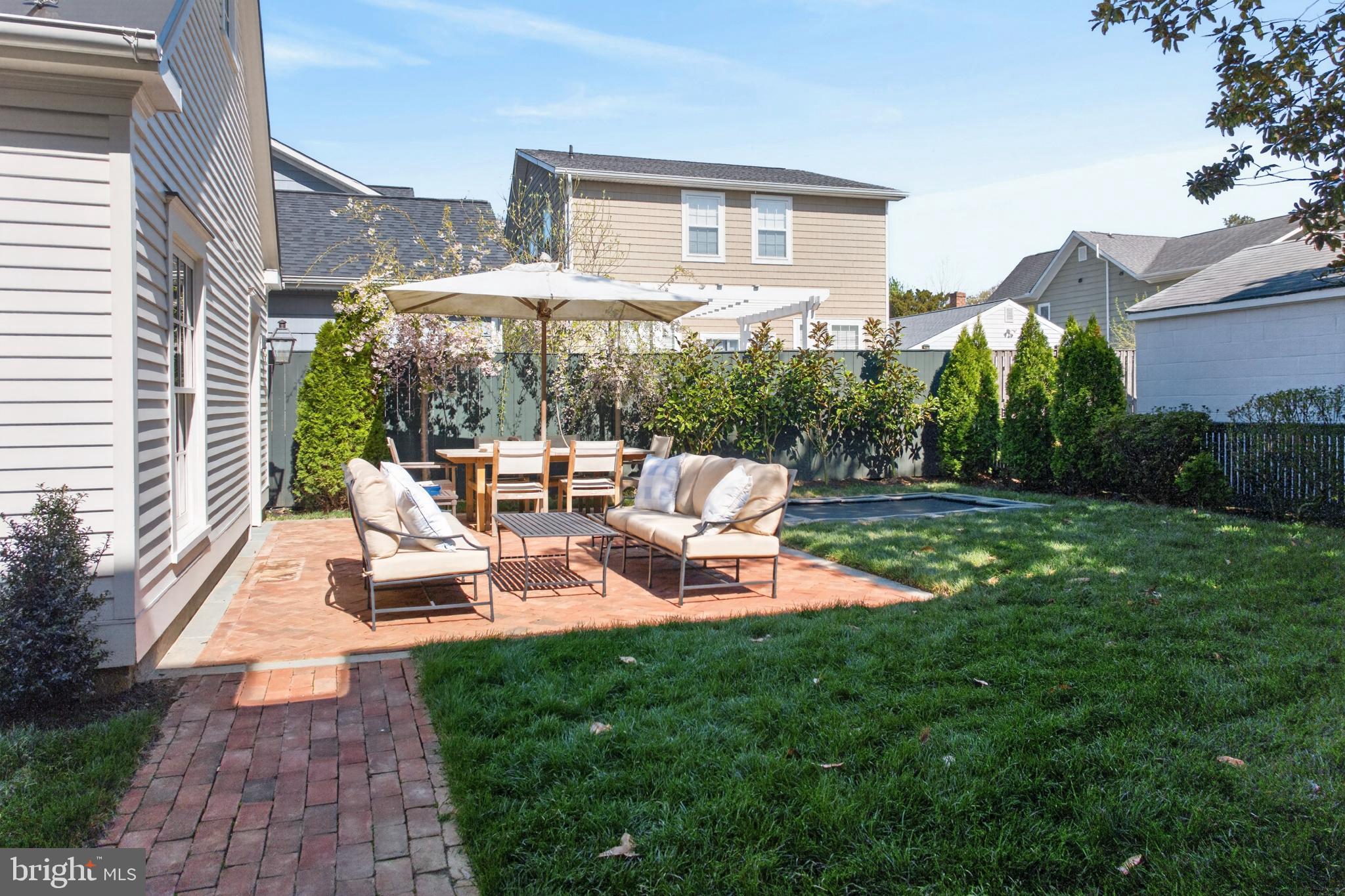 313 Washington Street Annapolis, MD 21403 - Photo 106 of 114 a view of a house with backyard sitting area and garden