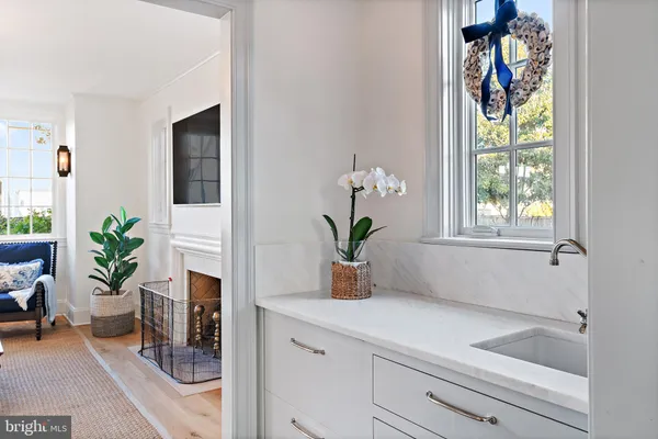 a kitchen with a refrigerator and cabinets