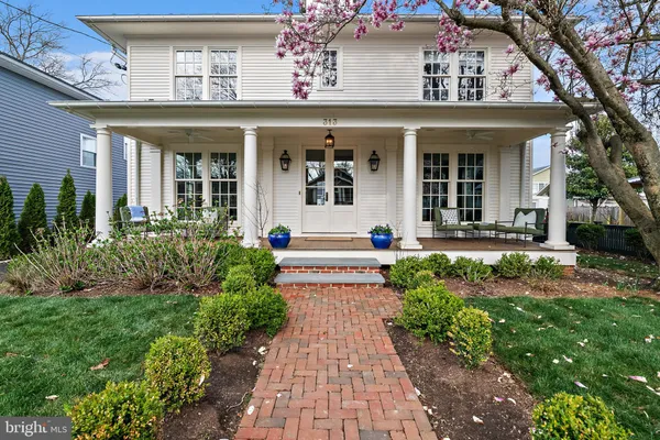 a front view of a house with outdoor space