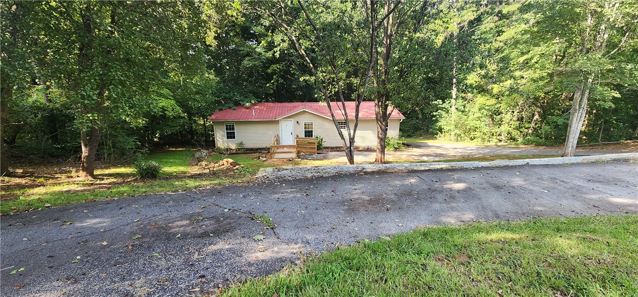 1541 Park Ridge Drive Seneca, SC 29672 - Photo 11 of 13 Extra paved parking at area in addition to parking next to the home