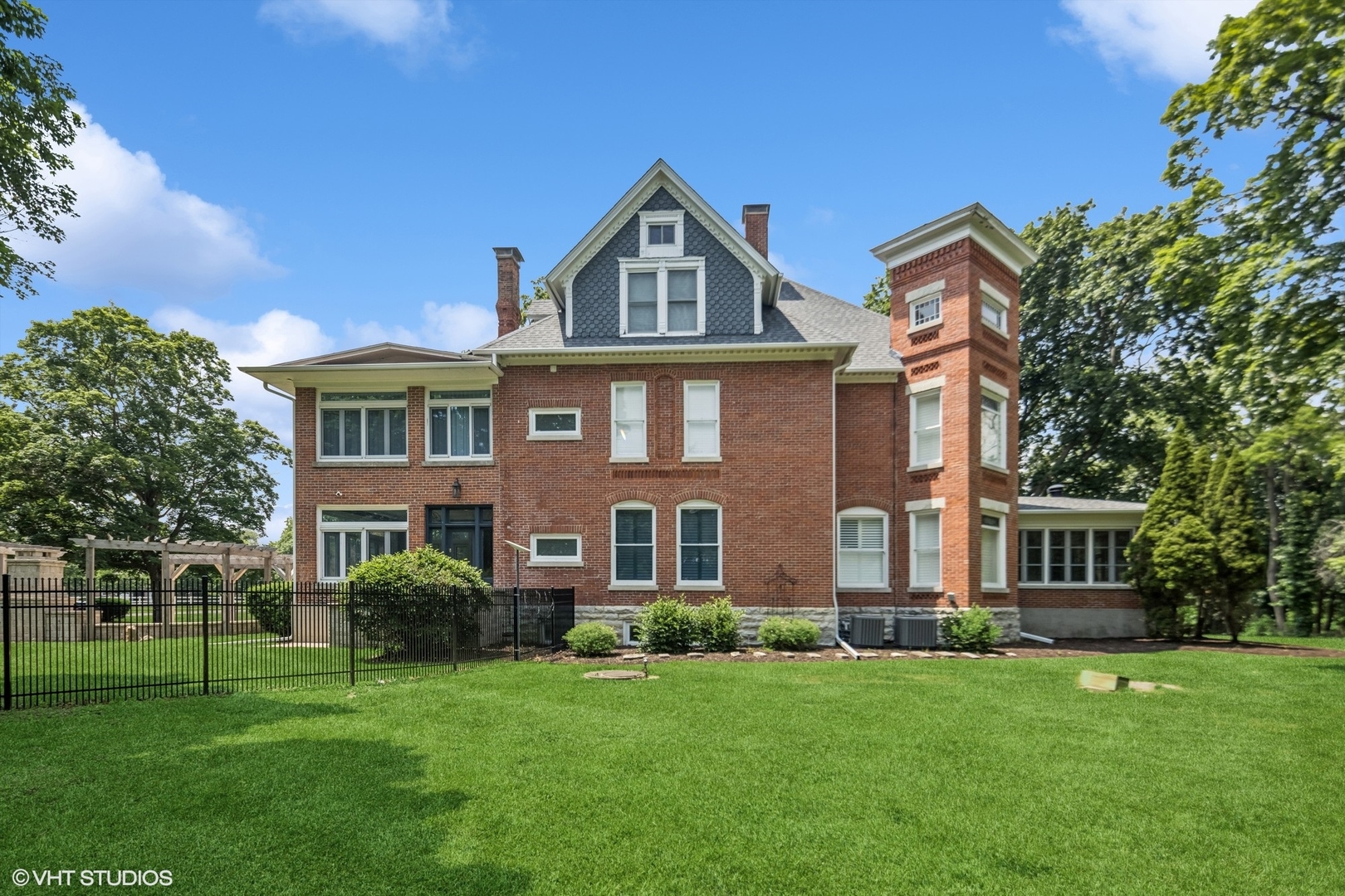 31W141 Army Trail Road Wayne, IL 60184 - Photo 1 of 51 a front view of a house with a garden