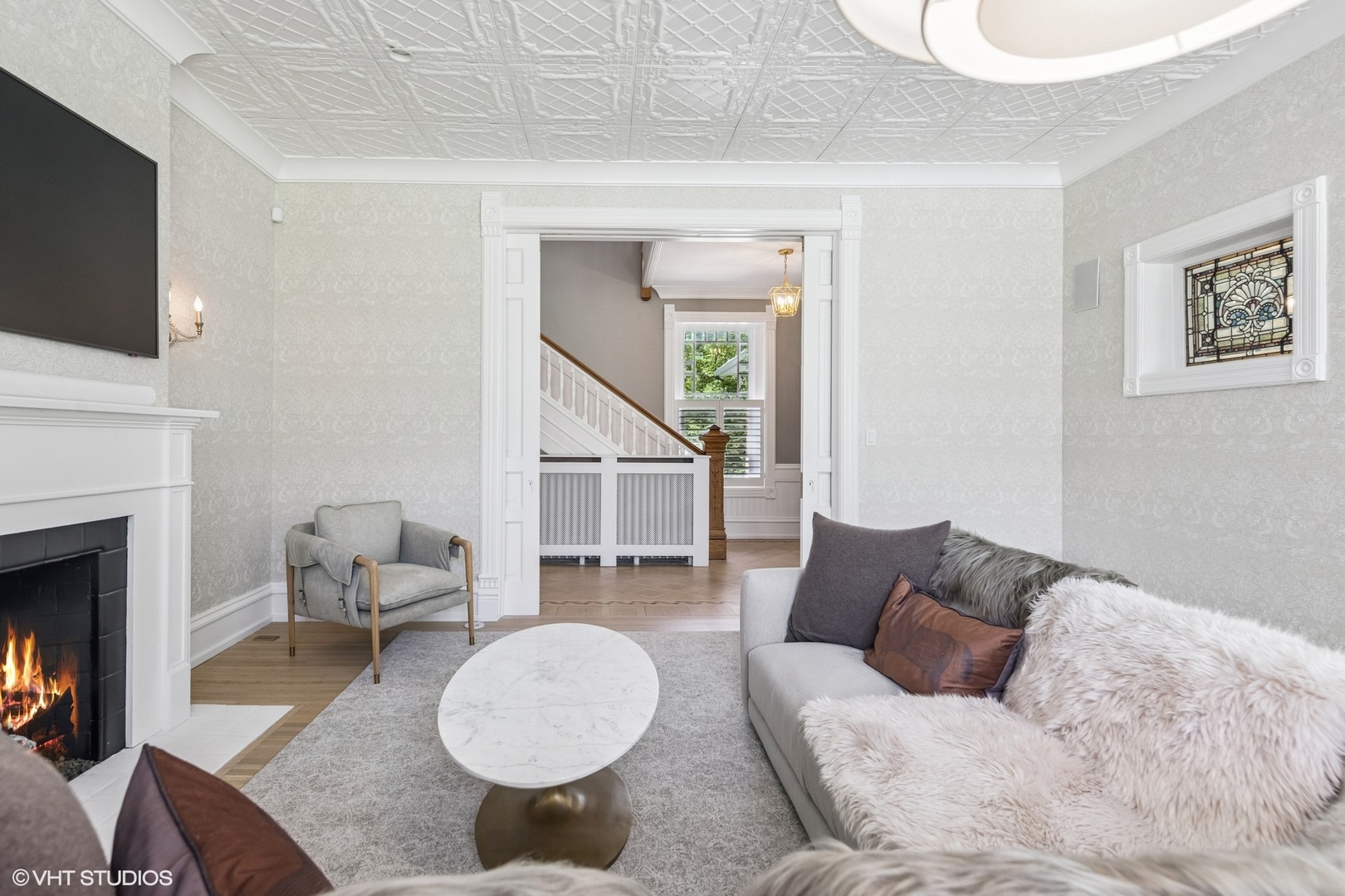 31W141 Army Trail Road Wayne, IL 60184 - Photo 15 of 51 a living room with furniture and a fireplace