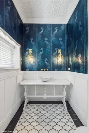 a bathroom with a vanity and a mirror