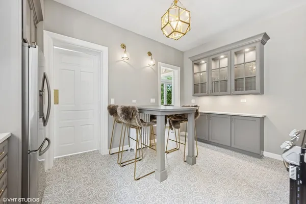 a kitchen with stainless steel appliances a stove sink and microwave