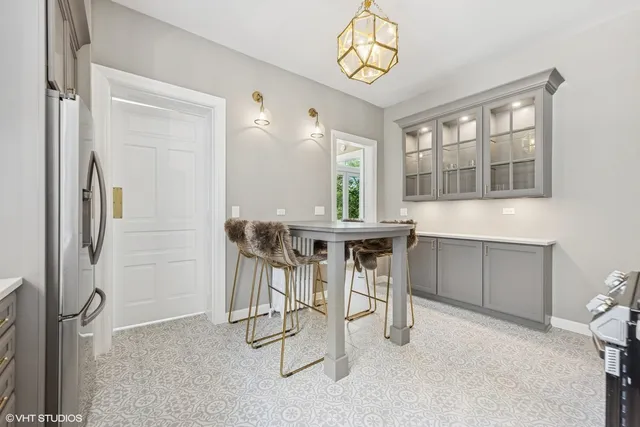 a kitchen with stainless steel appliances a stove sink and microwave