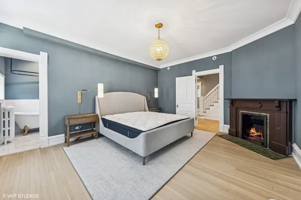 a spacious bathroom with a sink and a mirror