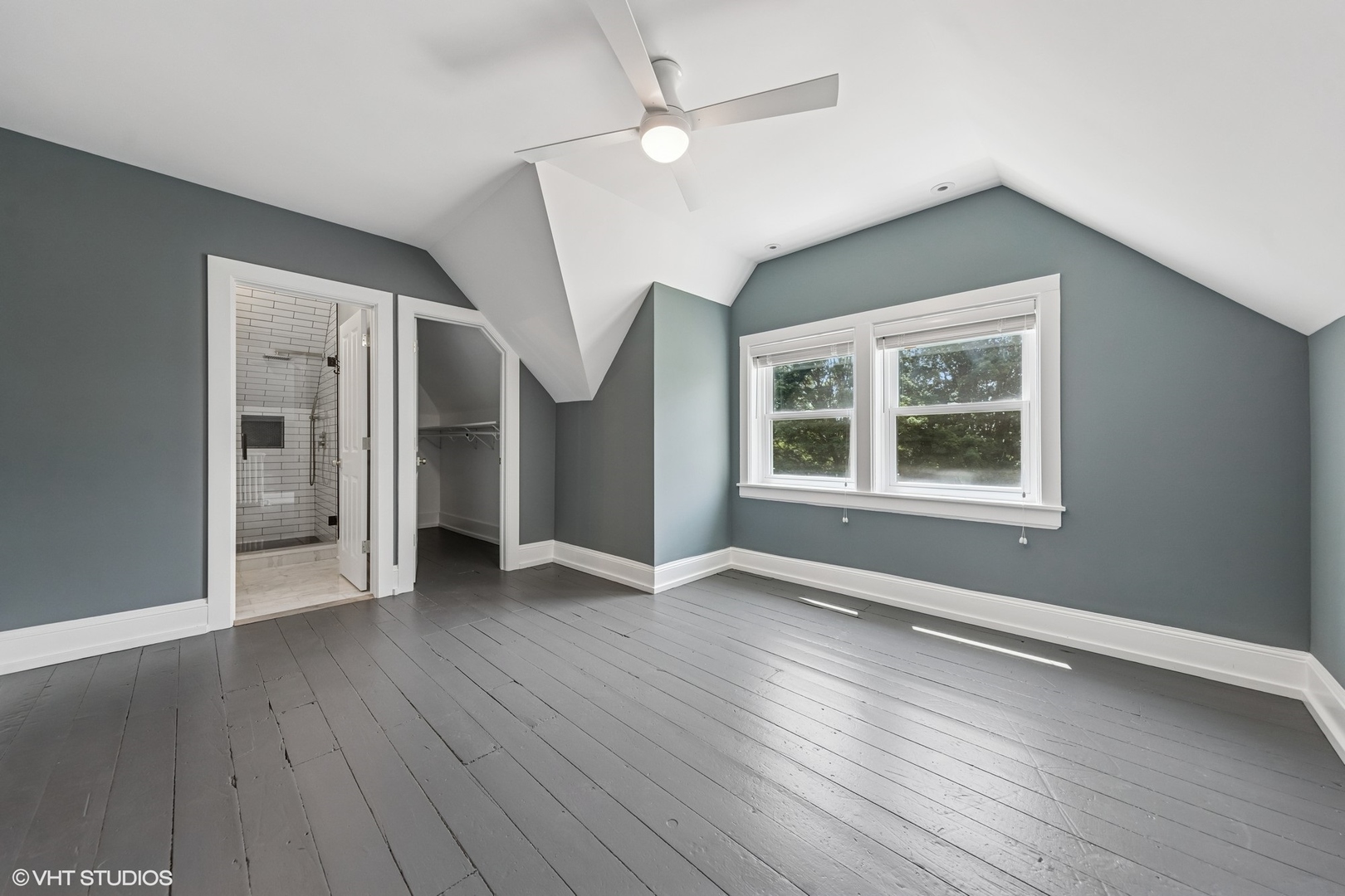 31W141 Army Trail Road Wayne, IL 60184 - Photo 48 of 51 an empty room with wooden floor chandelier and windows