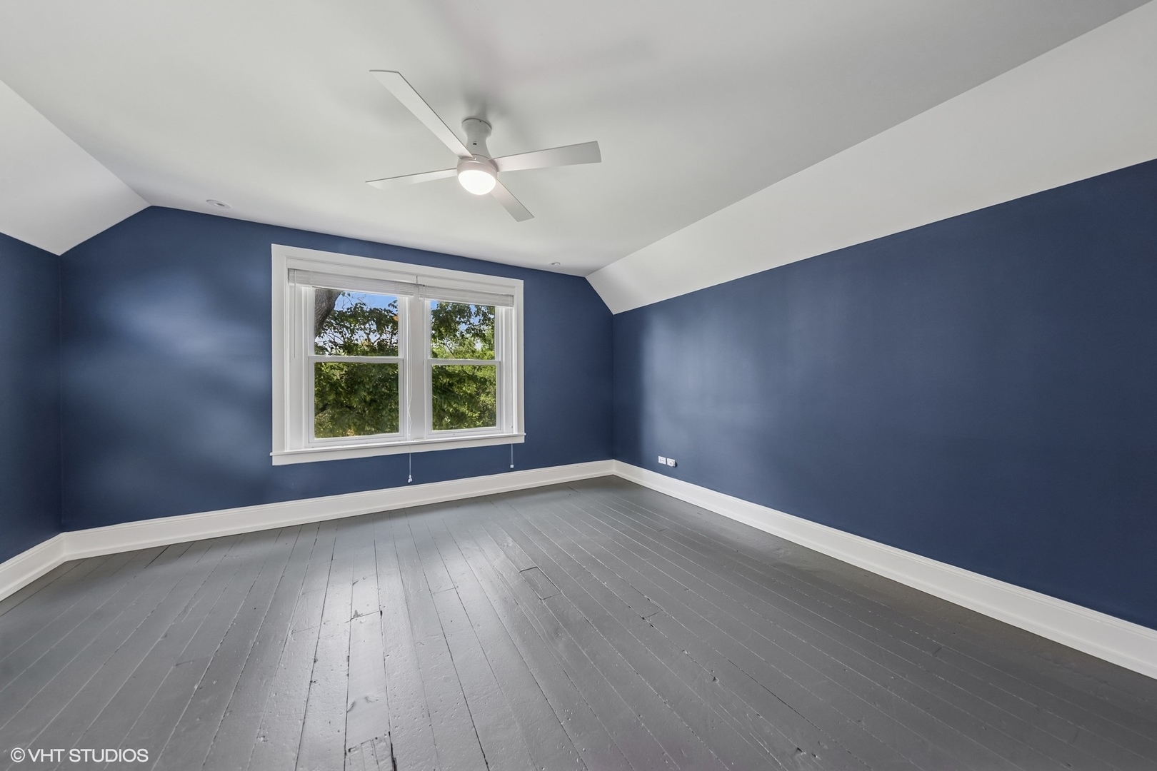 31W141 Army Trail Road Wayne, IL 60184 - Photo 50 of 51 a view of an empty room with wooden floor and a window