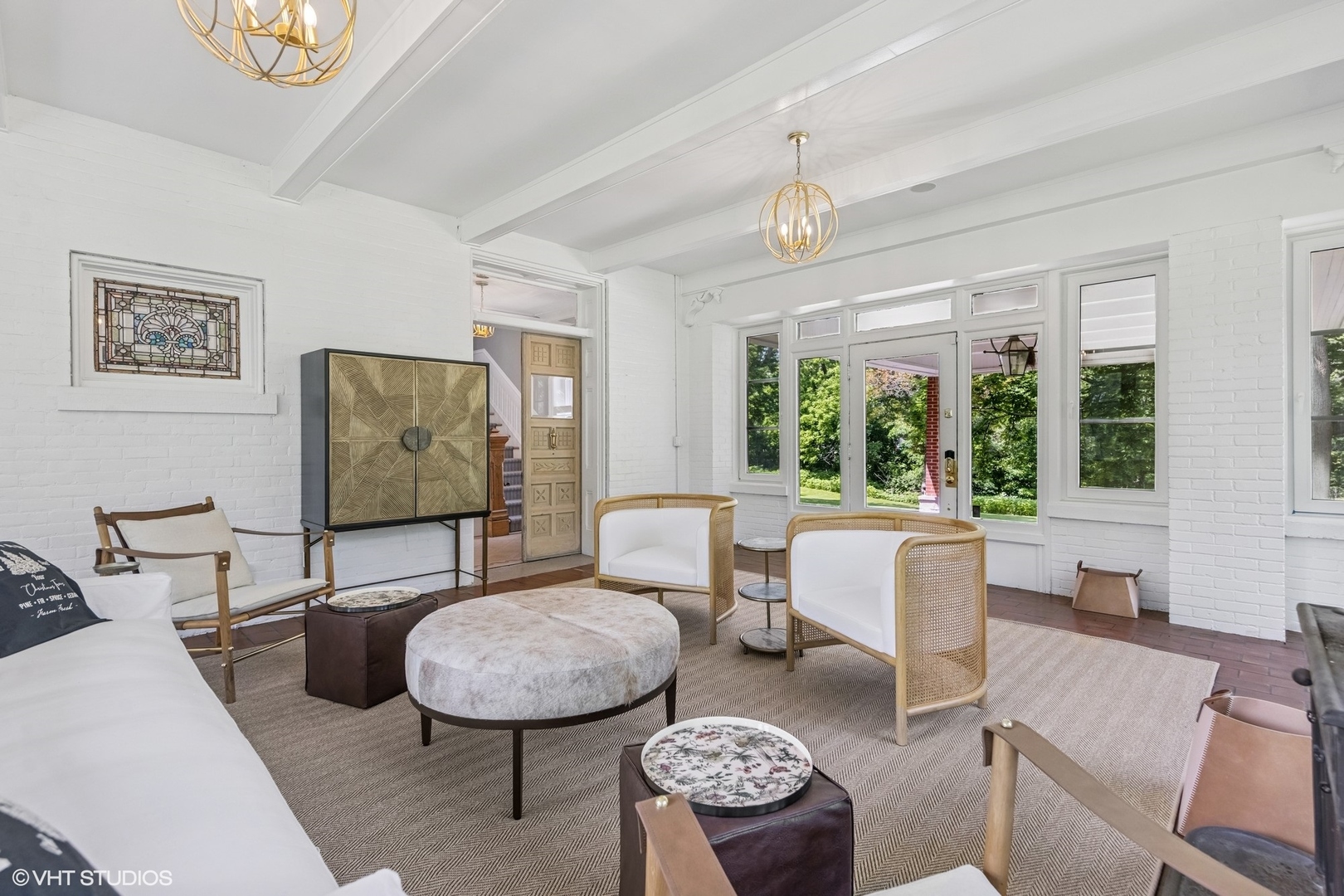 31W141 Army Trail Road Wayne, IL 60184 - Photo 5 of 51 a living room with furniture a large window and a chandelier