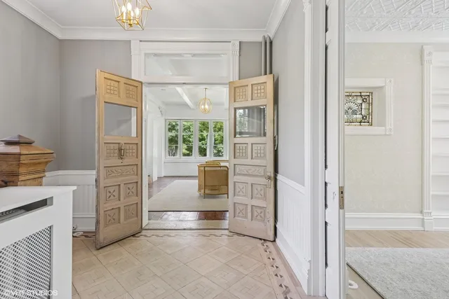 a view of kitchen with furniture and windows