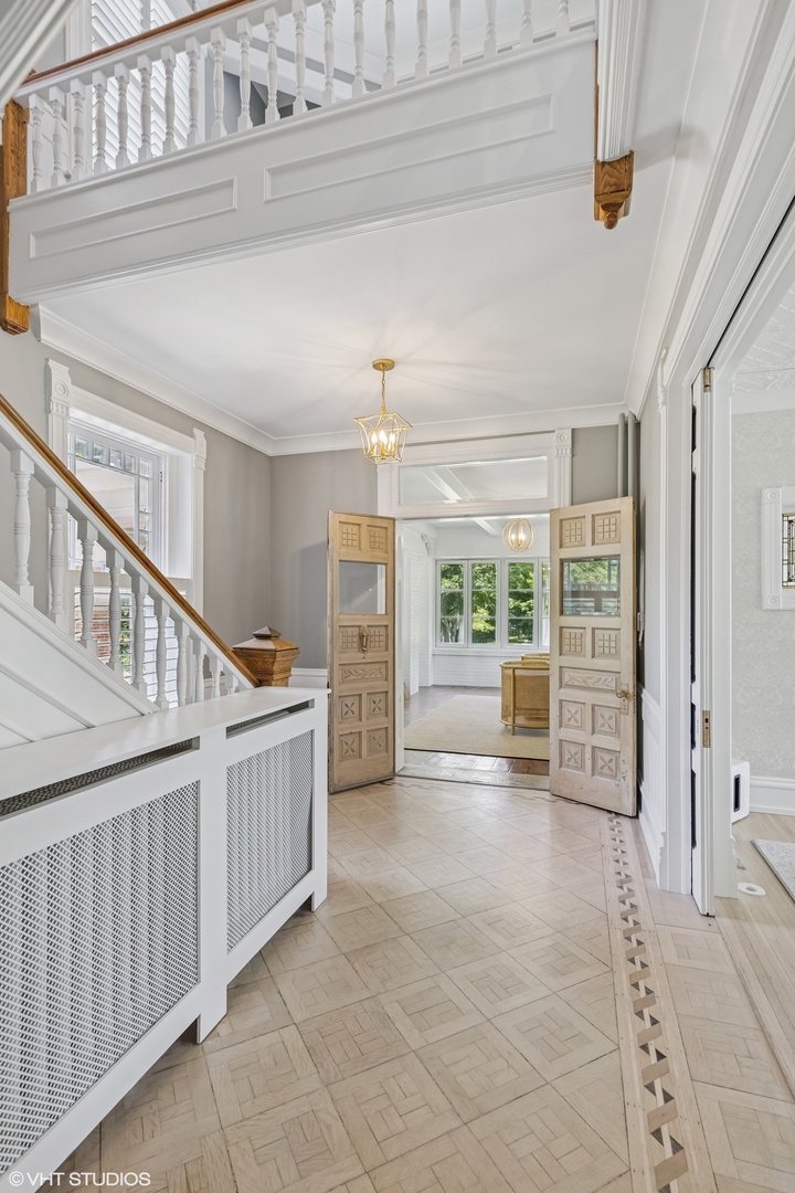 31W141 Army Trail Road Wayne, IL 60184 - Photo 10 of 51 a view of staircase with white walls and windows
