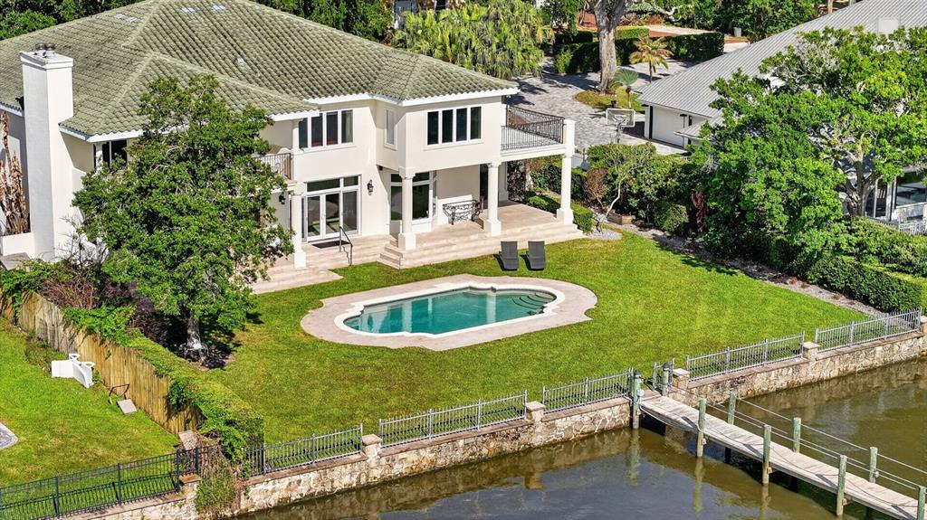 70 Riverside Drive Ormond Beach, FL 32176 - Photo 2 of 68 a view of a house with backyard and sitting area