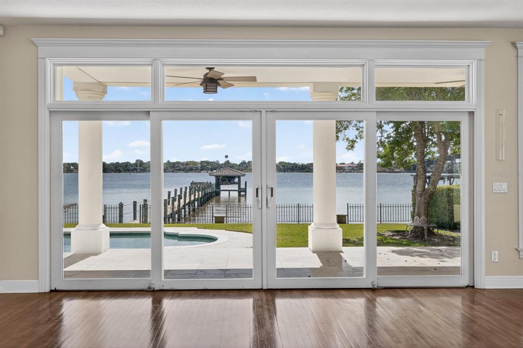 70 Riverside Drive Ormond Beach, FL 32176 - Photo 24 of 68 a view of a living room and floor to ceiling window