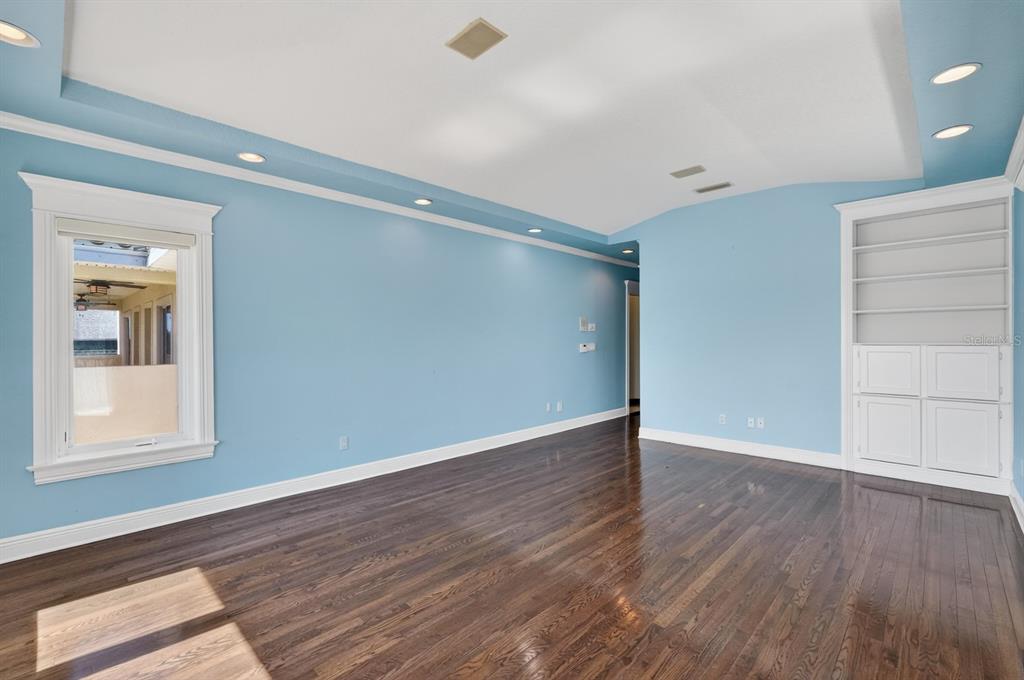 70 Riverside Drive Ormond Beach, FL 32176 - Photo 40 of 68 wooden floor in an empty room with a window