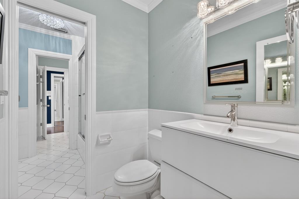 70 Riverside Drive Ormond Beach, FL 32176 - Photo 51 of 68 a bathroom with a toilet sink and shower