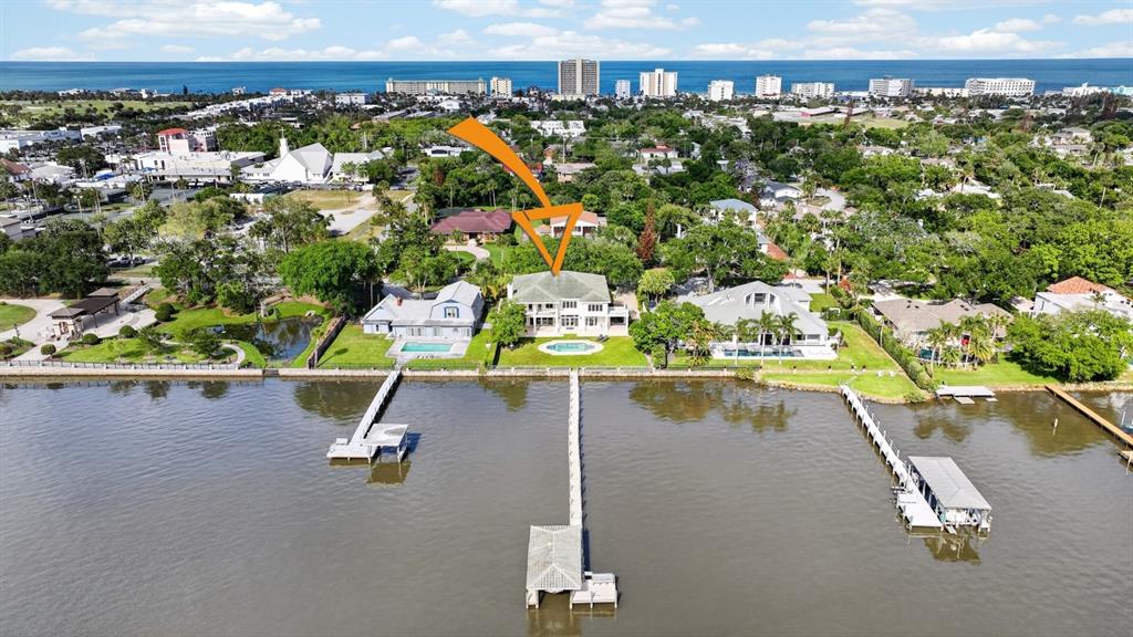 70 Riverside Drive Ormond Beach, FL 32176 - Photo 6 of 68 an aerial view of a swimming pool and outdoor space