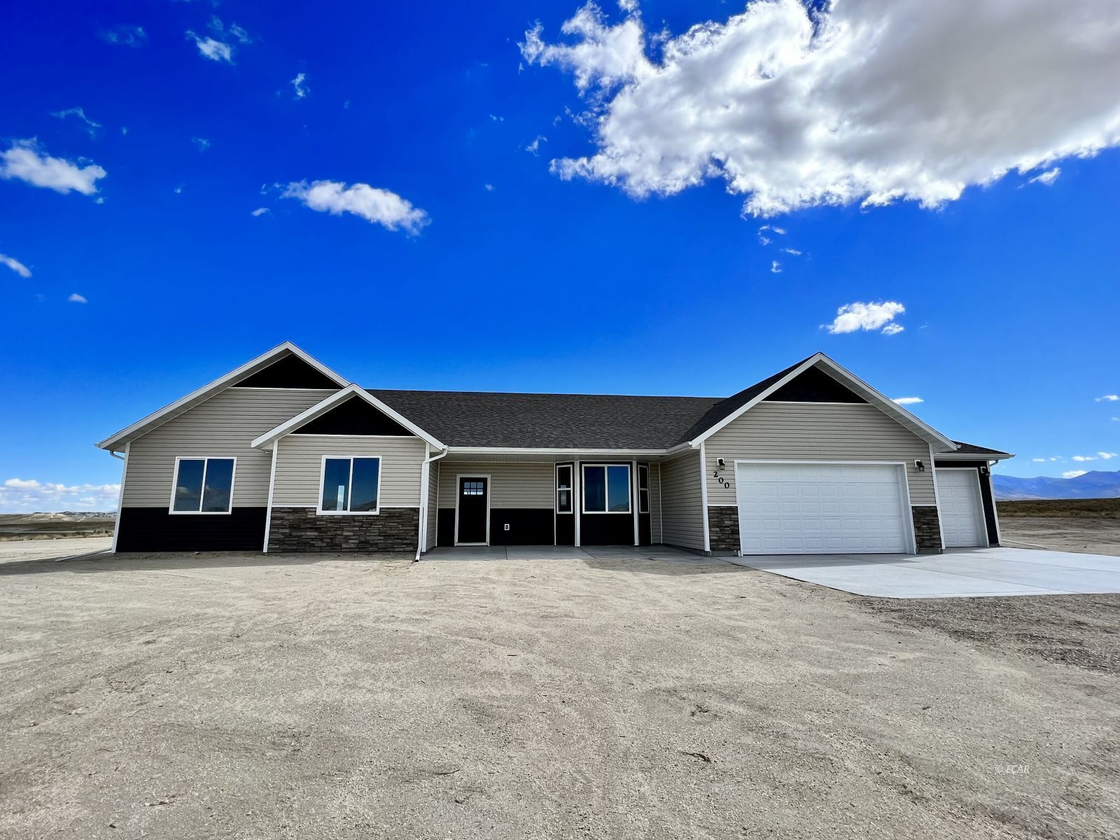 200 Ridgeway Drive Spring Creek, NV 89815 - Photo 1 of 34 a view of a house with a yard