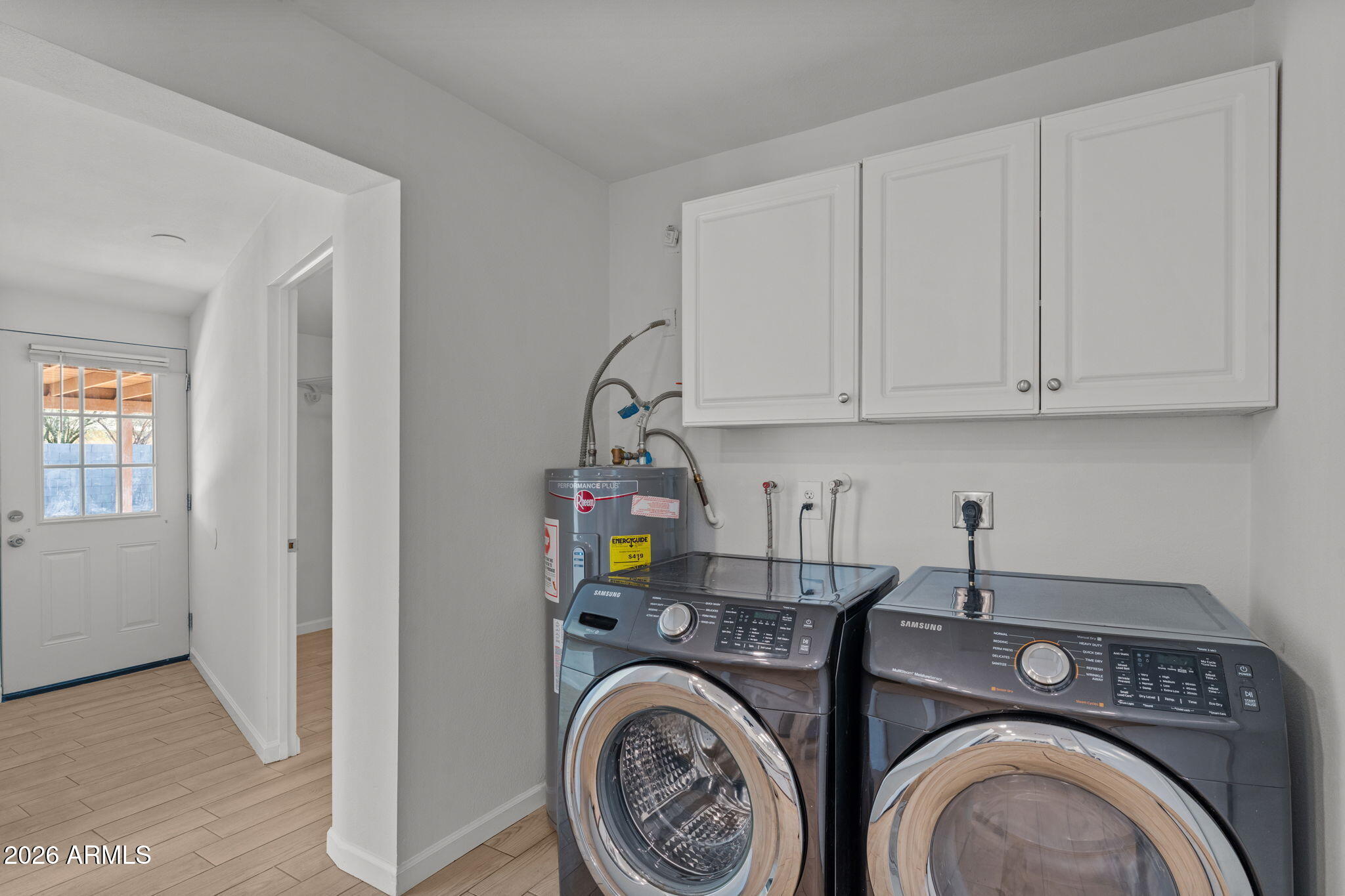 9257 West Gary Road Peoria, AZ 85345 - Photo 17 of 28 a utility room with dryer and washer
