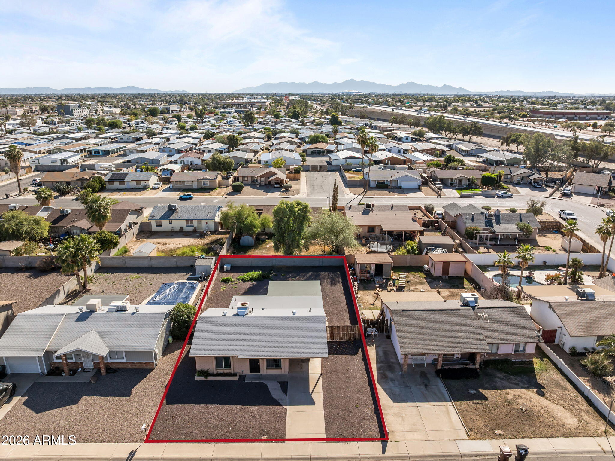 9257 West Gary Road Peoria, AZ 85345 - Photo 21 of 28 an aerial view of a residential houses with city view