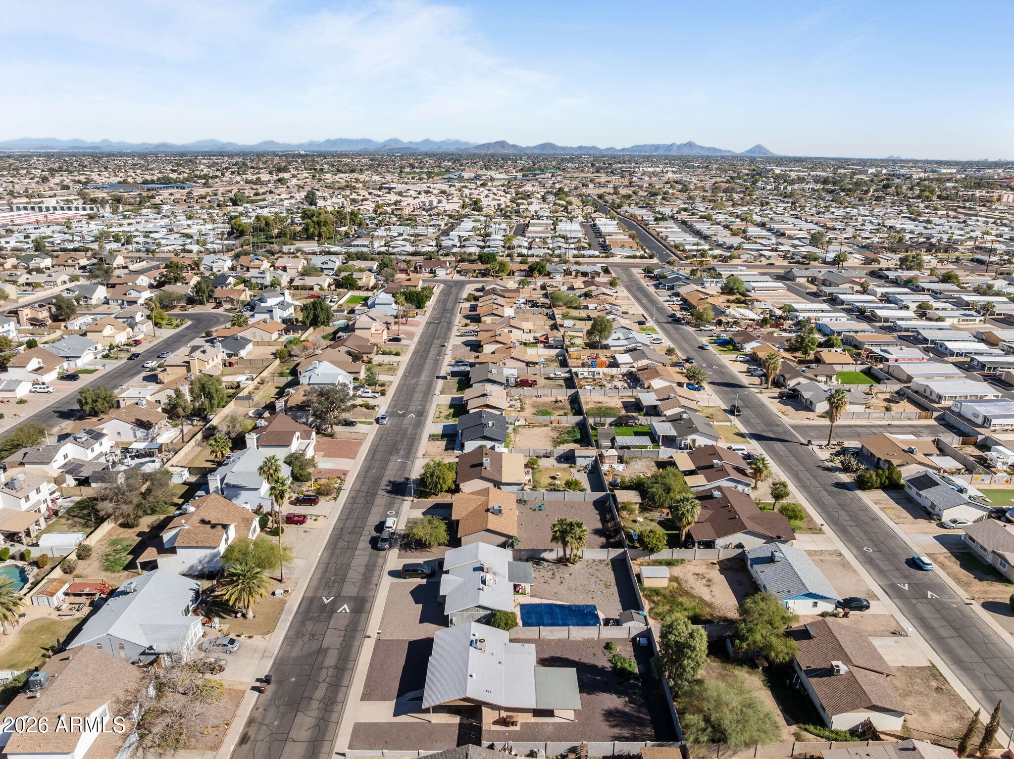 9257 West Gary Road Peoria, AZ 85345 - Photo 24 of 28 an aerial view of multiple house