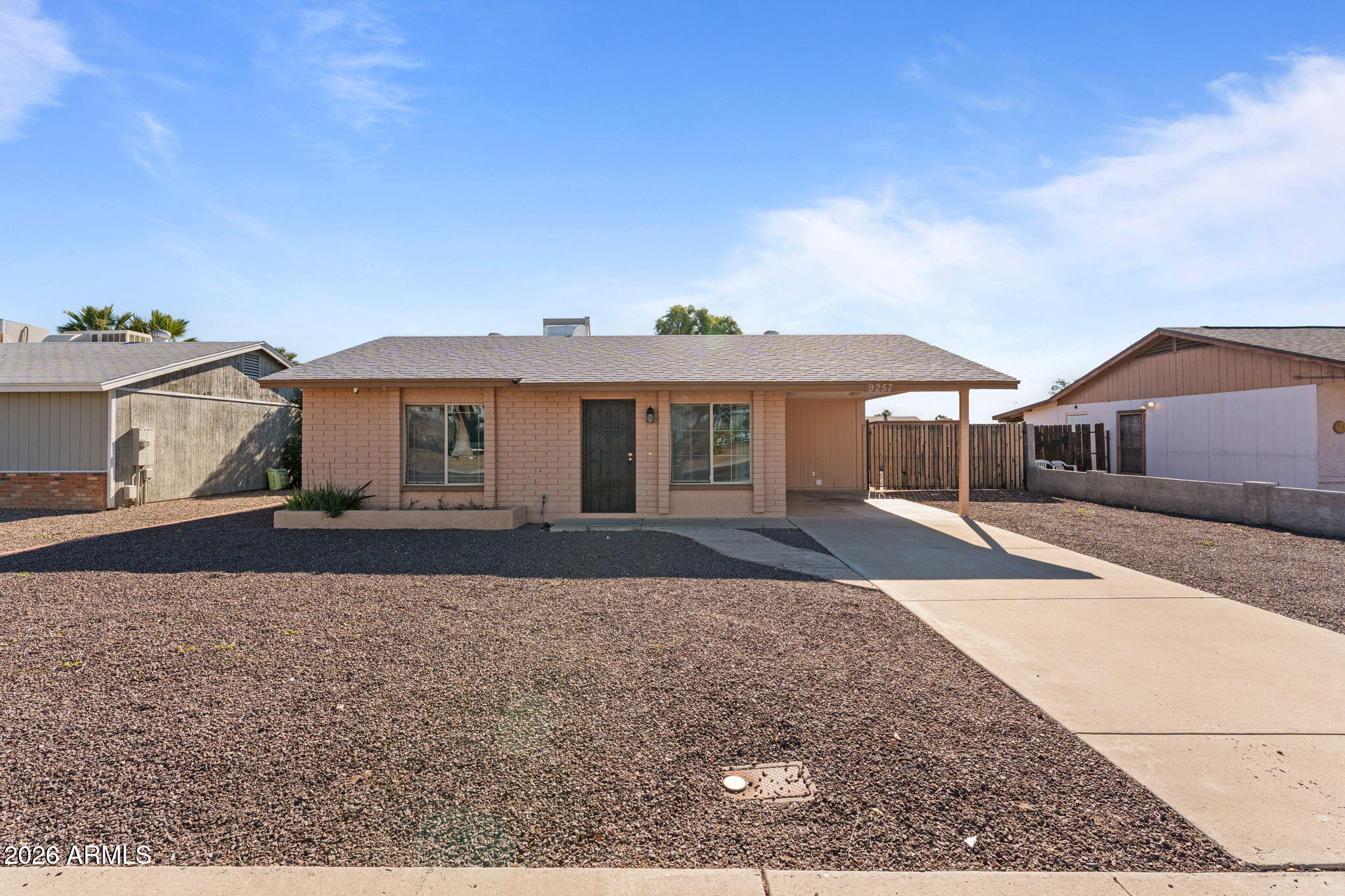 9257 West Gary Road Peoria, AZ 85345 - Photo 25 of 28 front view of a house and a yard