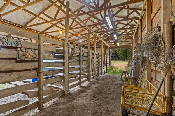 a backyard of a house with yard and outdoor seating